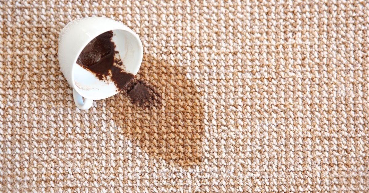 Dark coffee stain soaked into fabric
