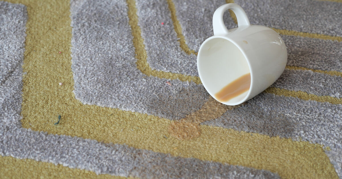 Faint coffee ring on clean rug
