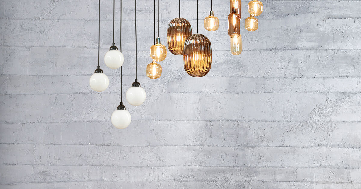 Various ceiling lights and lampshades overhead