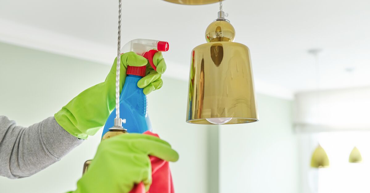 Damp cloth near light fitting