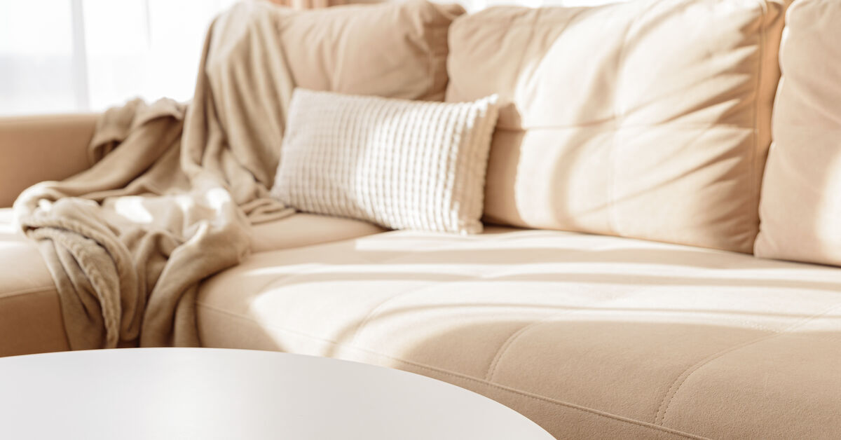 Clean sofa with protective cover