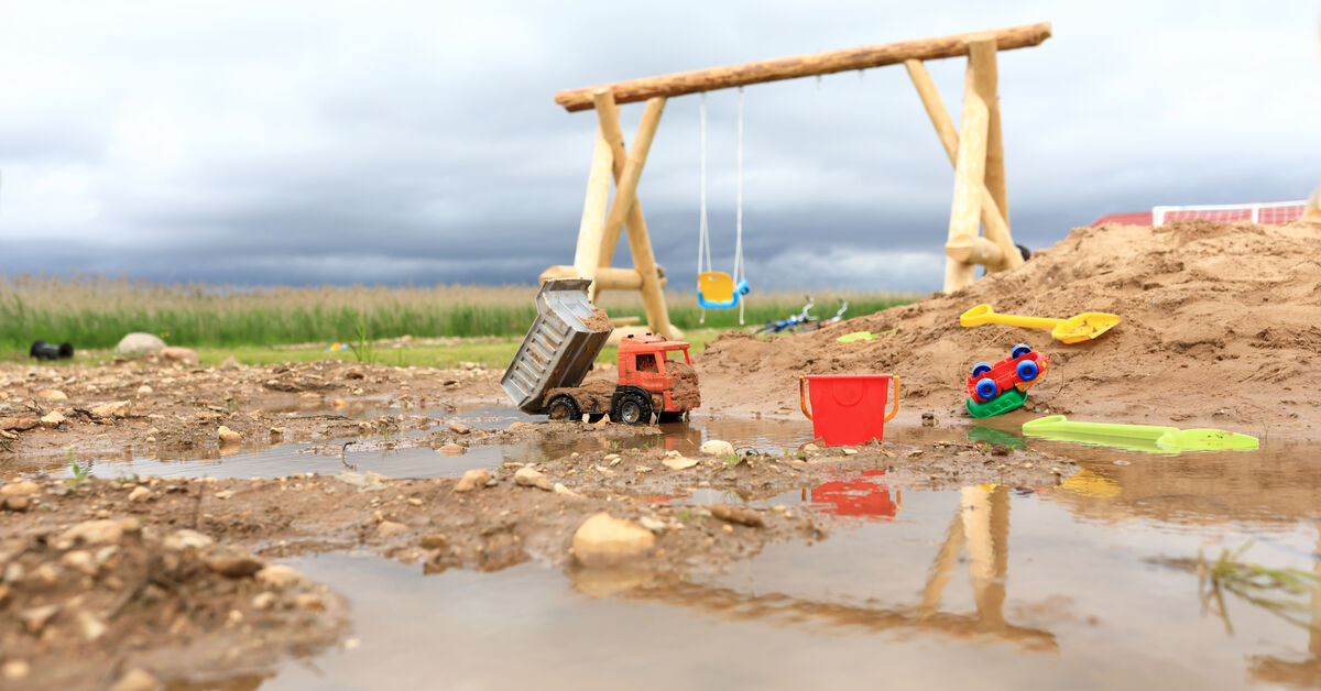 Soiled outdoor toys on the ground