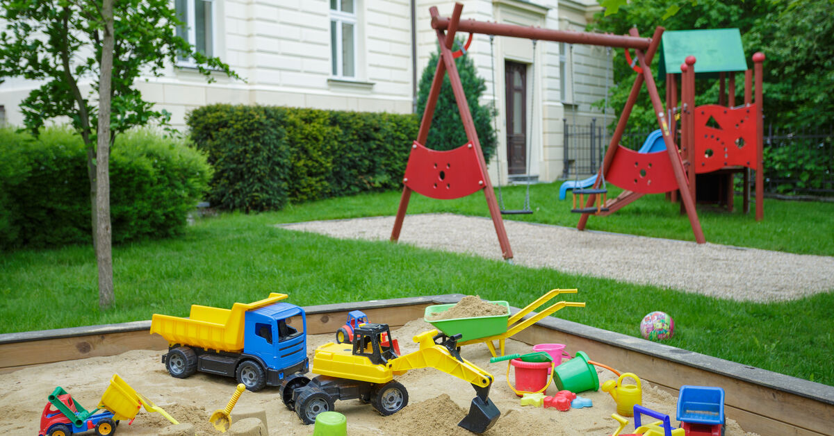 Sandbox protected with a fitted cover